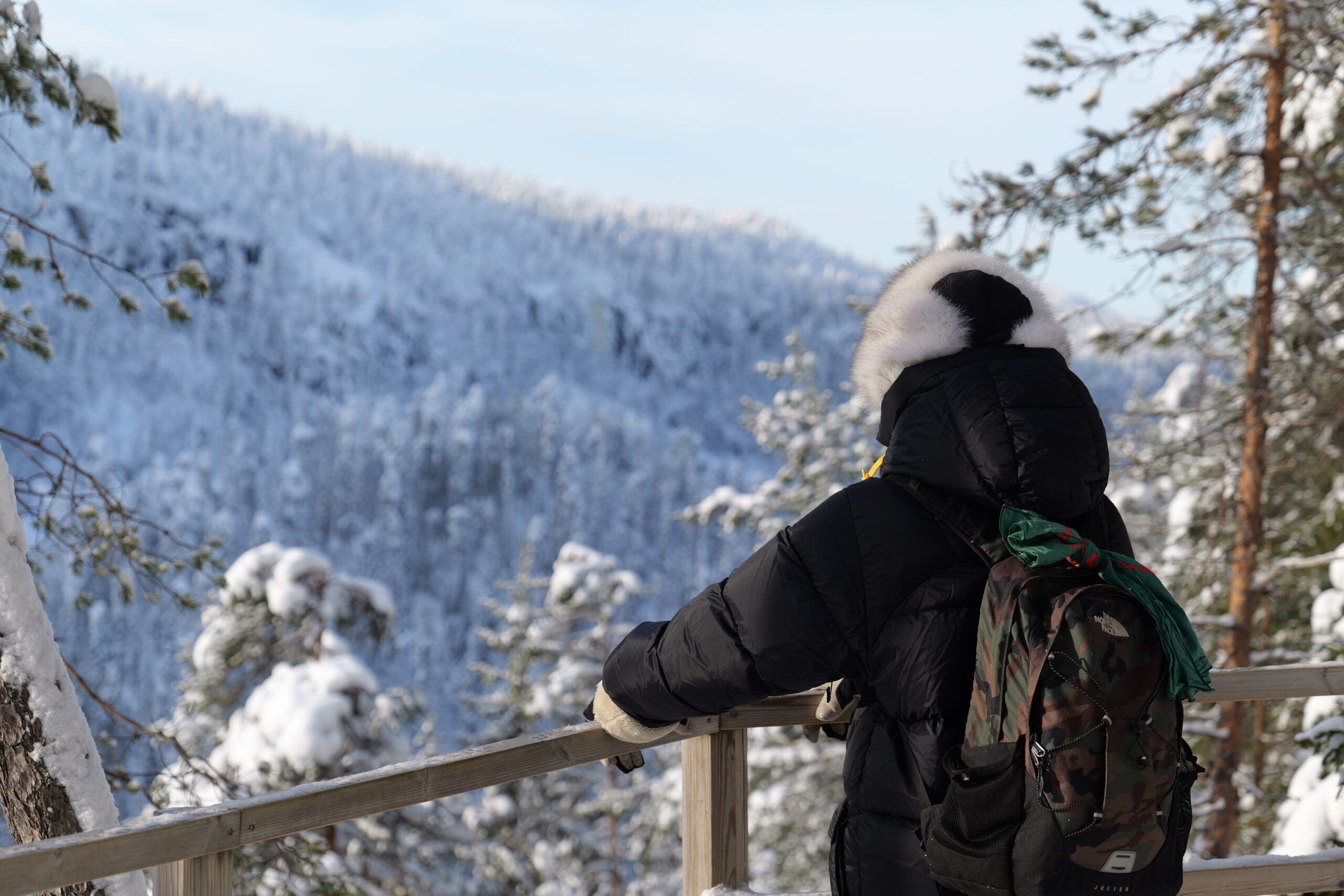 Guided winter hiking tour at Korouoma frozen waterfalls by Flow Lapland