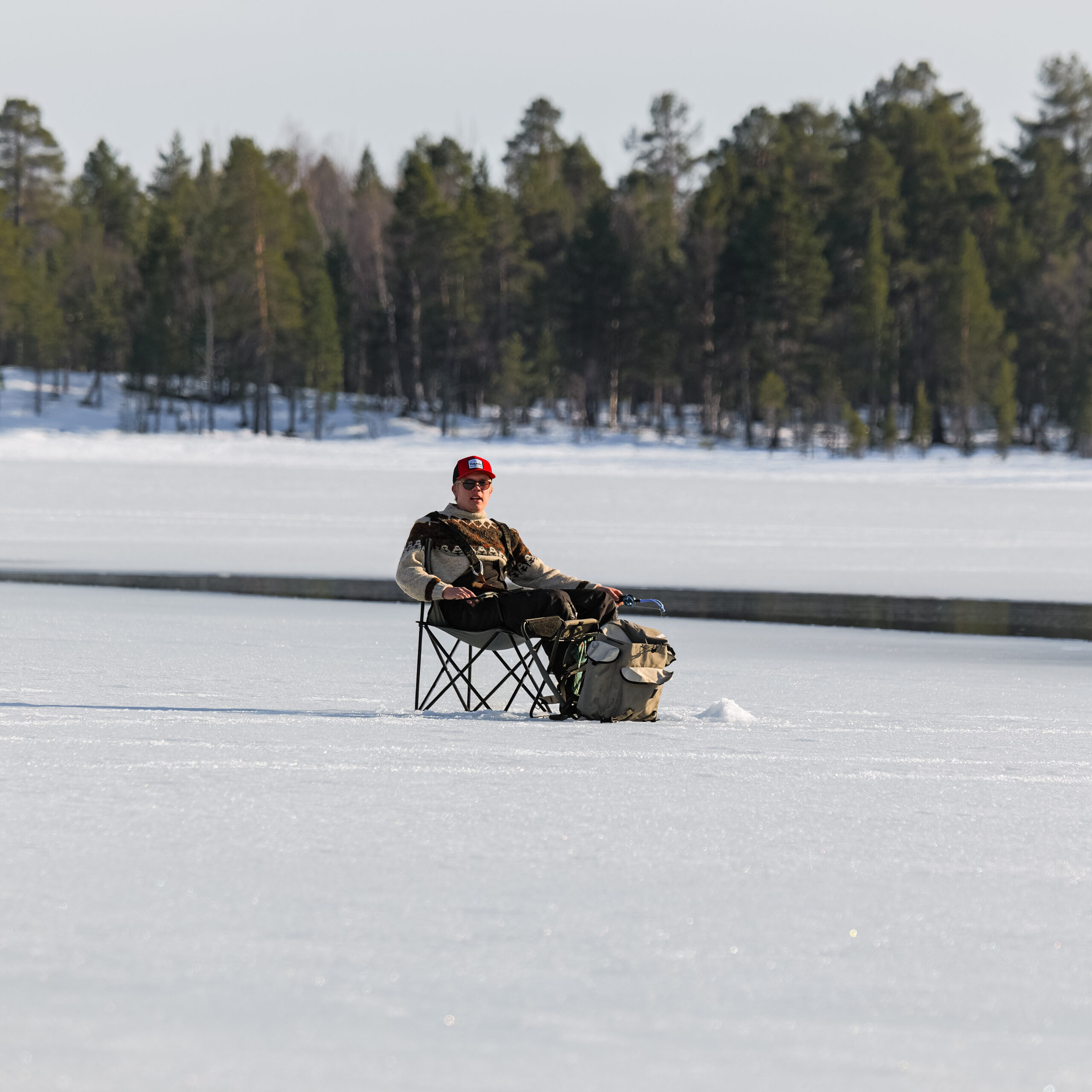 Safty equipment thick ice fishing lapland lake
